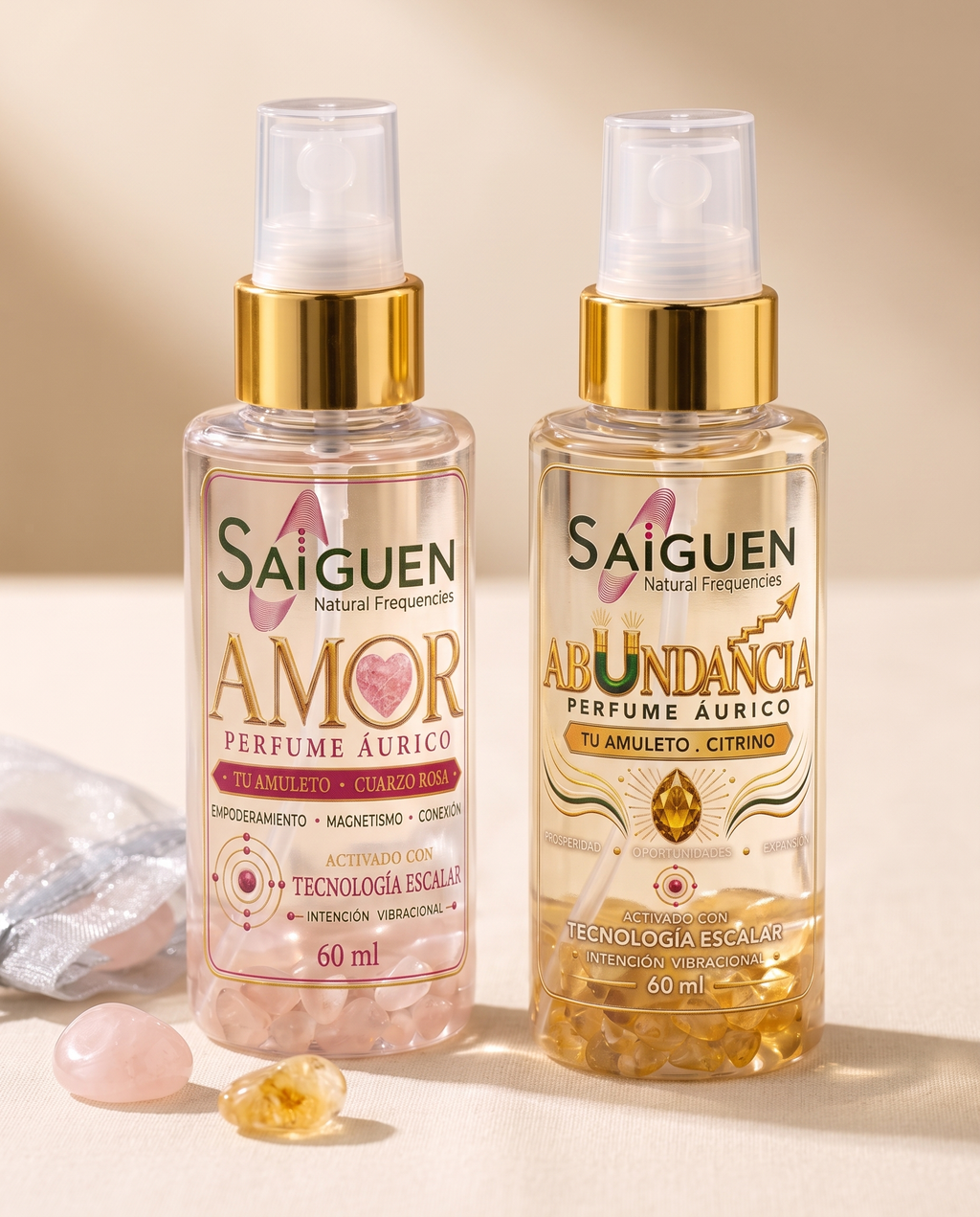 Dúo de perfumes áuricos Saiguen AMOR y ABUNDANCIA sobre lino crema con sus piedras amuleto
